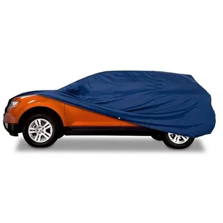 Blue all-weather car cover draped over a car in side profile