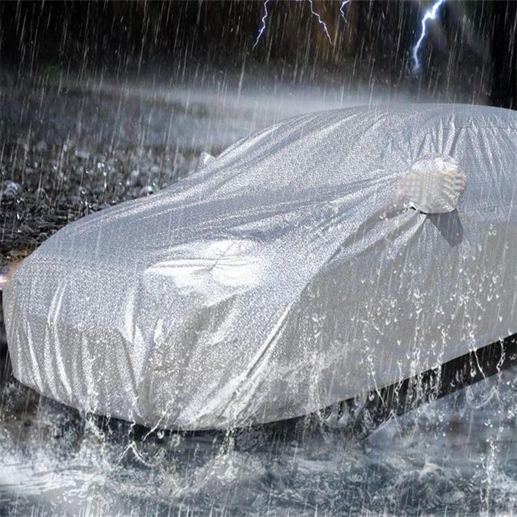 All weather car cover, metallic silver, covered vehicle in rain with water beading
