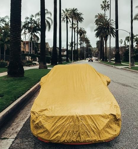 All weather car cover, yellow, full vehicle cover on street