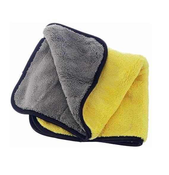 Folded microfiber cleaning cloth with gray and yellow sides, navy trim and black border