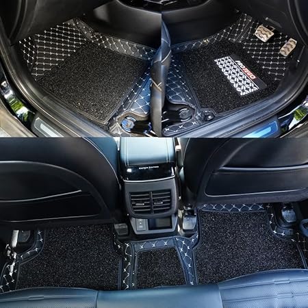 Installed custom-fit car floor mat with diamond-stitched trim and black carpet backing