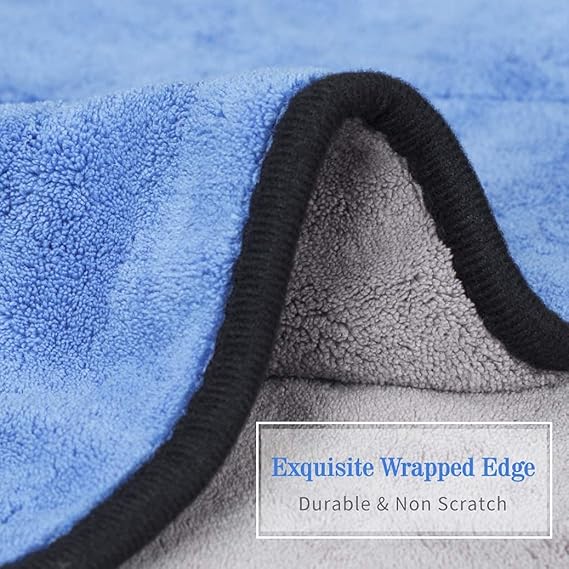 Light blue microfiber towel with black wrapped edge and soft, plush surface