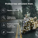 Camouflage two-wheeler cover over scooter with hooded top and draped sides