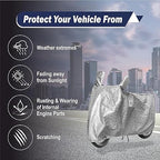 Silver two-wheeler cover over scooter, hooded with secure front tie straps